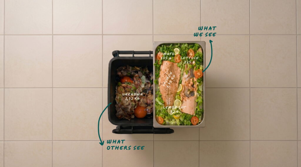 An overhead shot of two containers side by side on a tiled kitchen floor, illustrating Orbisk's food waste identification capability. The left container, labeled "What others see," shows an unidentified mixed food waste bin marked "Unknown 1.32 kg." The right container, labeled "What we see," shows the same contents identified in granular detail: salmon 1.32 kg, tomato 105 g, lettuce 225 g, and lemon cut 32 g.